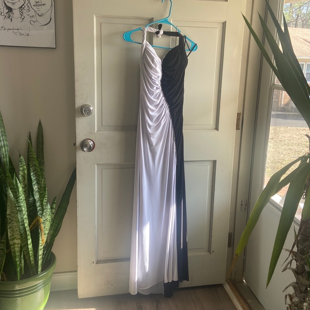 Beautiful black and white prom dress with thigh high leg slit
